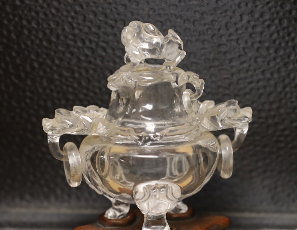 A Chinese rock crystal tripod censer and cover, on hardwood stand, 11cm
